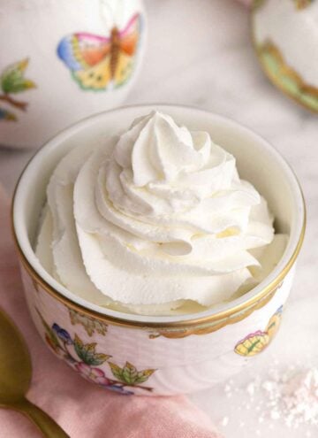 A small bowl of whipped cream.