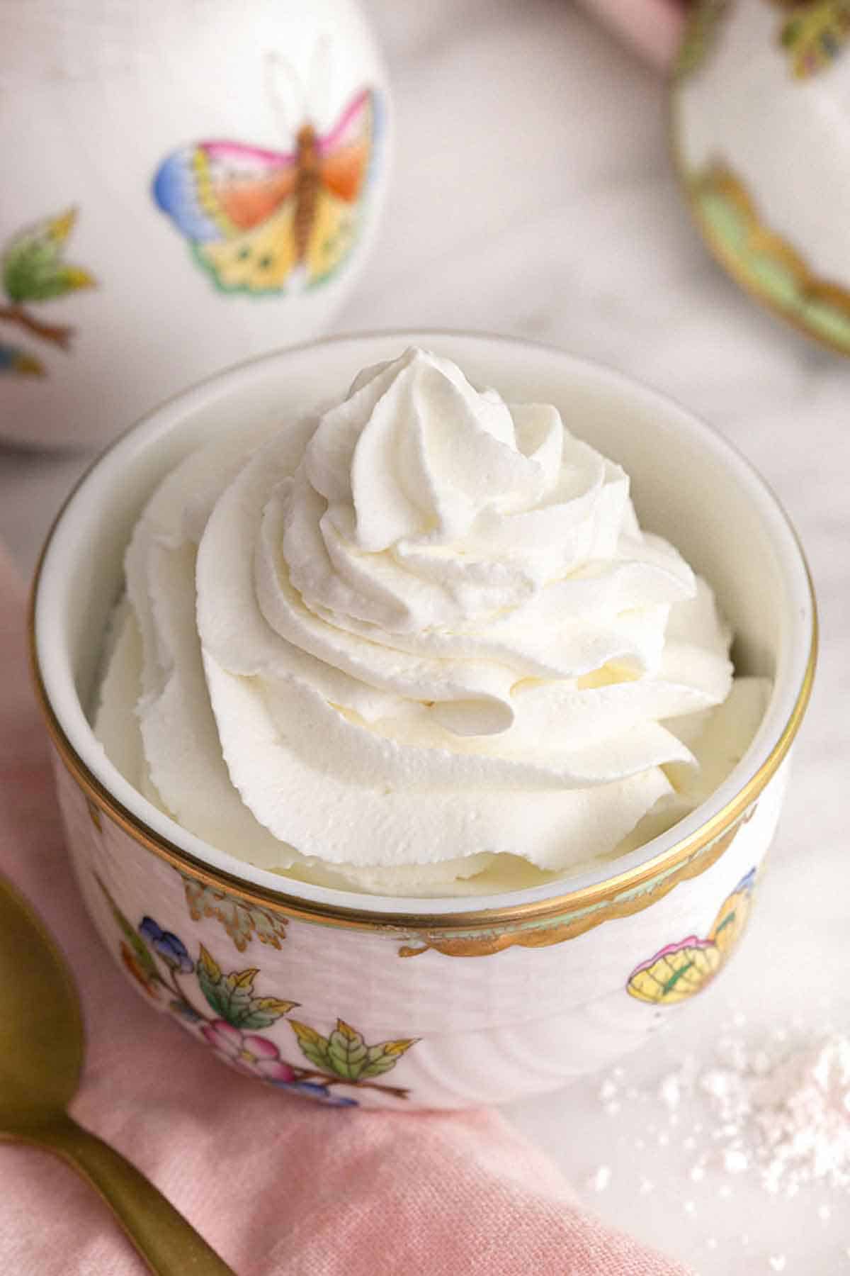 A small bowl of whipped cream.