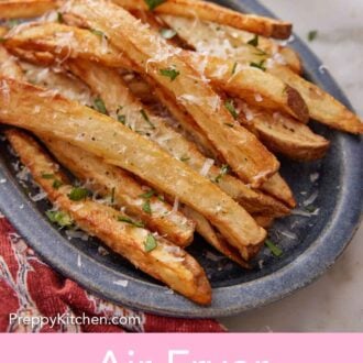 Pinterest graphic of a plate with air fryer french fries topped with parsley and parmesan.