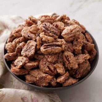 A bowl of candied pecans.