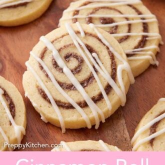 Pinterest graphic of two cinnamon roll cookies all drizzled with icing with more surrounding it, off to the side.