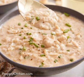 Pinterest graphic of a spoonful of crab soup lifted from the soup bowl.