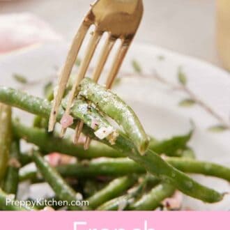 Pinterest graphic of a fork lifting up a bite of French green beans.