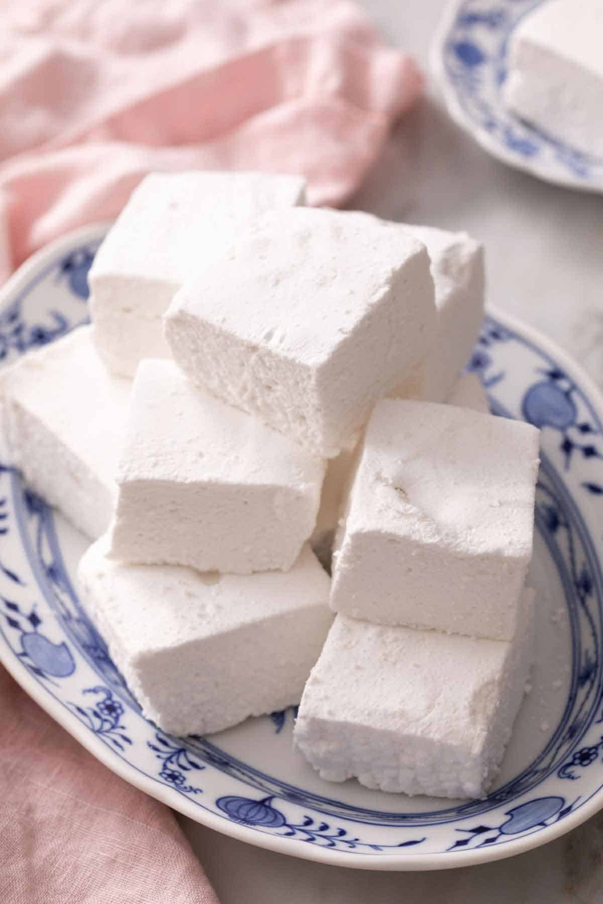 A platter of homemade marshmallows cut into squares.