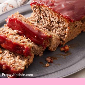 Pinterest graphic of a platter with a meatloaf with three slices cut in front.