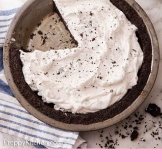Pinterest graphic of an overhead view of a Oreo pie crust in a pie pan with a fluffy white filling.