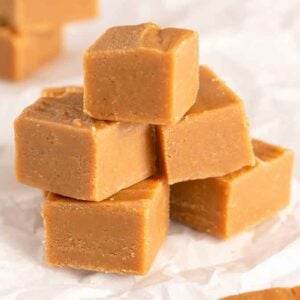 Multiple pieces of peanut butter fudge in a small pile.