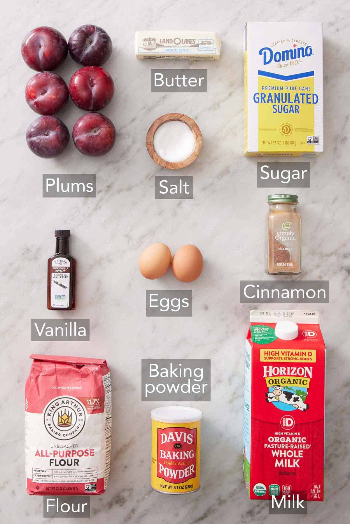 Ingredients needed to make plum cake.