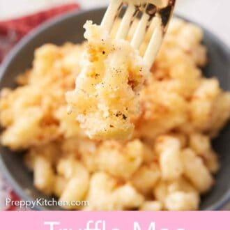 Pinterest graphic of a forkful of truffle mac and cheese lifted from a bowl.