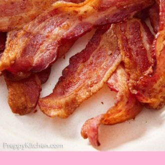 Pinterest graphic of a close up view of air fryer bacon on a plate.