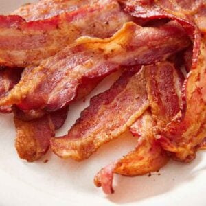 Close up view of air fryer bacon.