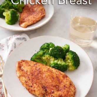 Pinterest graphic of two plates of air fryer chicken breasts with a side of broccoli.