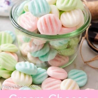 Pinterest graphic of a jar of cream cheese mints with more scattered around it.