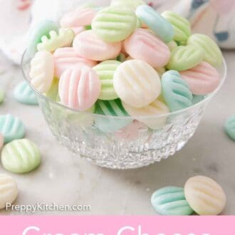 Pinterest graphic of a bowl of cream cheese mints with more around it.