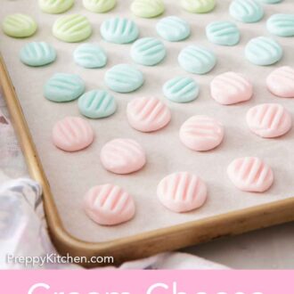 Pinterest graphic of cream cheese mints on a lined sheet pan.