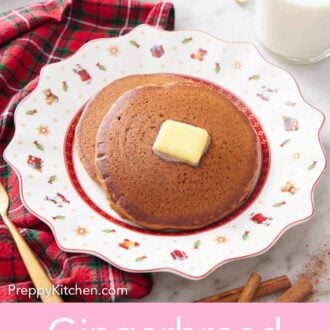 Pinterest graphic of a plate gingerbread pancakes with a knob of butter on top. A glass of milk in the back.