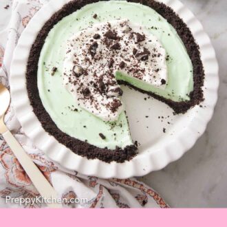 Pinterest graphic of a grasshopper pie in a baking dish with a slice taken out.