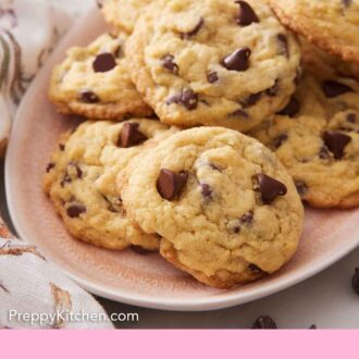 Pinterest graphic of a platter of pudding cookies with some chocolate chips scattered around.