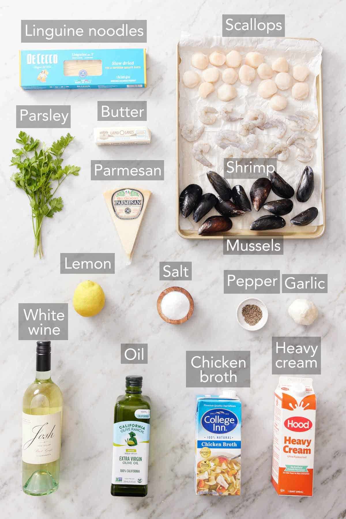 Ingredients needed to make seafood pasta.