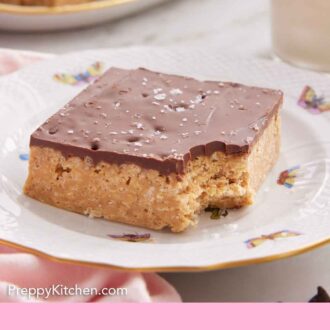 Pinterest graphic of a plate with a Special K bar with a bite taken out of the corner.