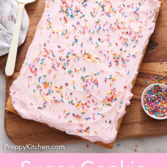 Pinterest graphic of an overhead view of a frosted sugar cookie bar with sprinkles on a wooden serving board, uncut.