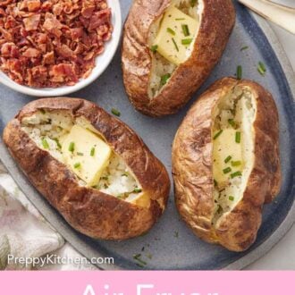 Pinterest graphic of a platter with three air fryer baked potatoes topped with butter and chives with a bowl of crumbled bacon and a fork.