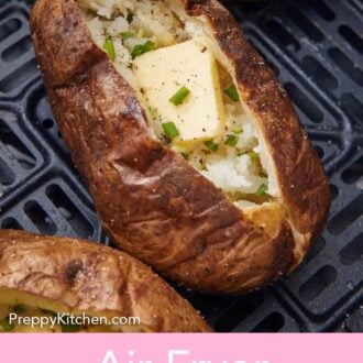 Pinterest graphic of air fryer baked potatoes in an air fryer basket topped with butter, chives, and pepper.