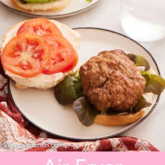 Pinterest graphic of a plate with an opened face air fryer turkey burger with a glass of water in the back.