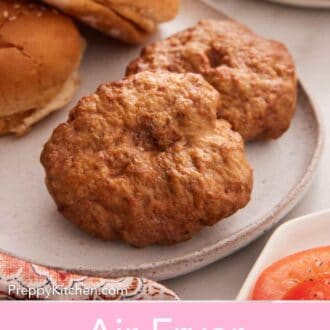 Pinterest graphic of two air fryer turkey patties on a plate with buns in the background.