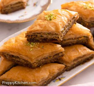 Pinterest graphic of a platter of baklava stacked in three layers with a plate with one baklava in the back.