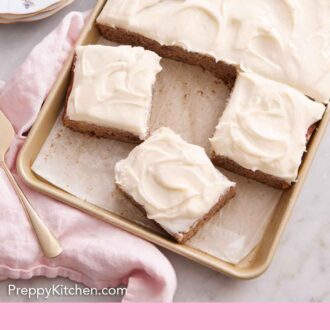 Pinterest graphic of an overhead view of banana bars on a sheet pan with three slices cut.