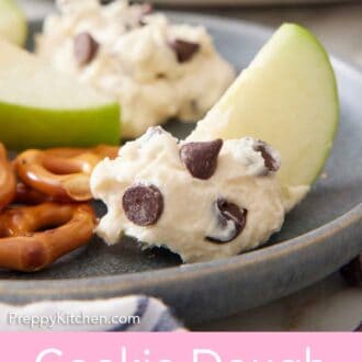 Pinterest graphic of a plate with slice of apple dipped in cookie dough dip.