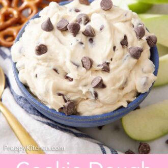Pinterest graphic of small bowl of cookie dough dip surrounded by apple slices and pretzels.