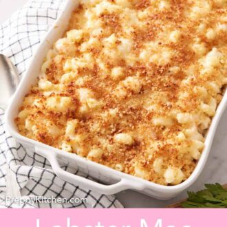 Pinterest graphic of a baking dish of lobster mac and cheese with toasted breadcrumbs on top.