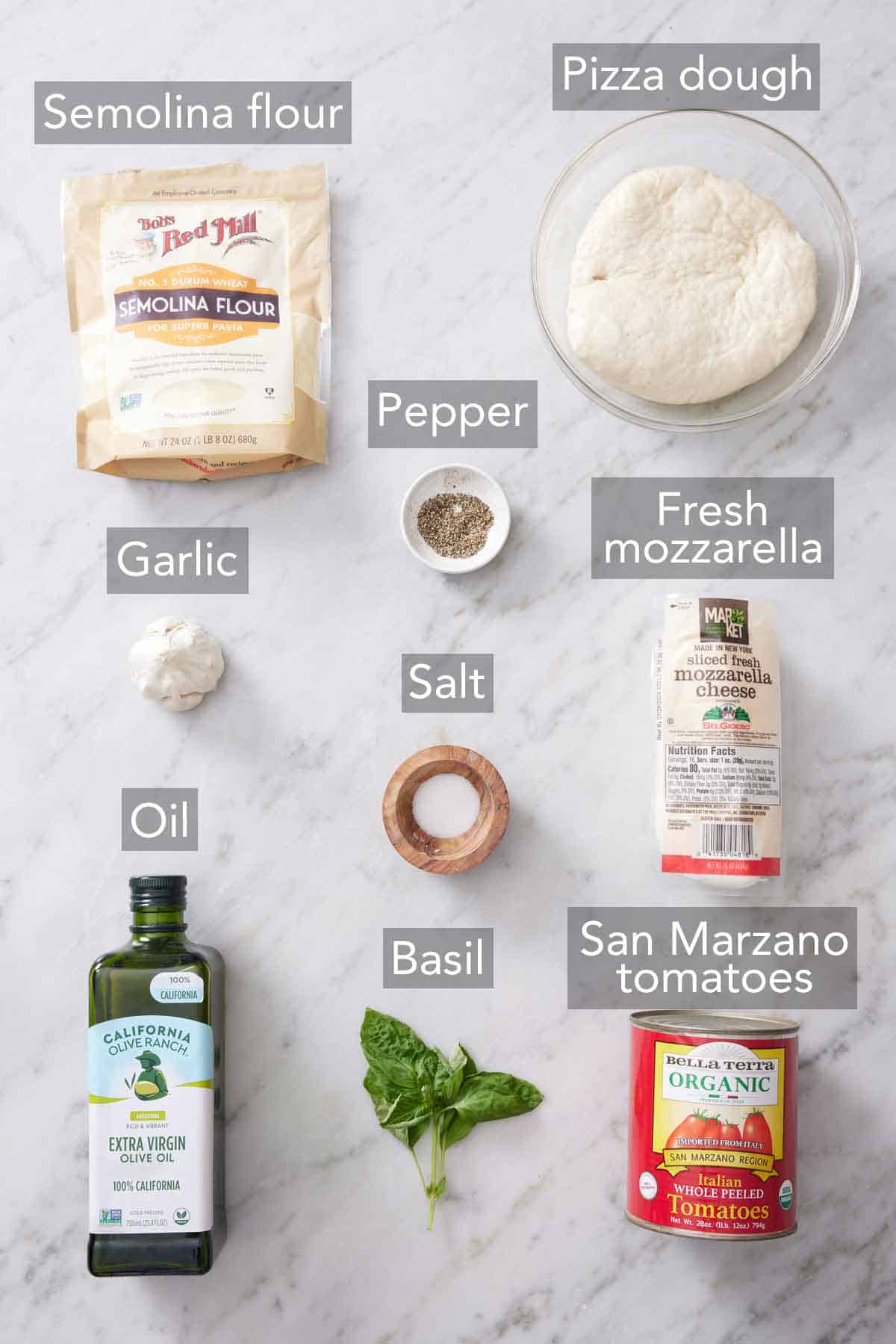 Ingredients needed to make a margherita pizza.
