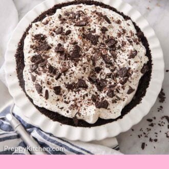 Pinterest graphic of an overhead view of a mud pie in a white baking dish.