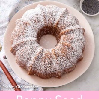 Pinterest graphic of a poppy seed cake on a platter dusted with powdered sugar. Coffee and poppy seed in the back with some plates and forks.