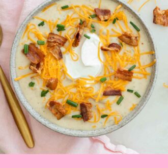 Pinterest graphic of an overhead view of a bowl of potato soup with cheese, bacon, sour cream, and chives as garnish.