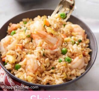 Pinterest graphic of a bite of shrimp fried rice lifted with a fork from a bowl.