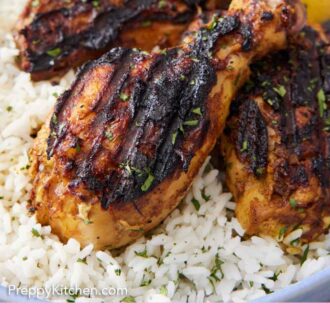 Pinterest graphic of a close up view of tandoori chicken over a bed of rice.