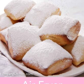 Pinterest graphic of powdered sugar dusted over a platter of air fryer beignets.