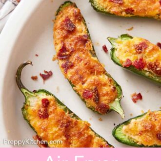 Pinterest graphic of an overhead view of a couple of air fryer jalapeno poppers on a platter.