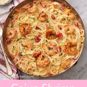 Pinterest graphic of an overhead view of a skillet of cajun shrimp pasta.