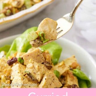 Pinterest graphic of a fork lifting up some curried chicken salad from a plate.