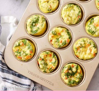 Pinterest graphic of egg muffins in a muffin tin. A linen napkin, stack of plates, and forks off to the side.