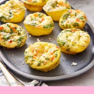 Pinterest graphic of a platter of egg muffins topped with crumbled feta. Stack of plates in the background.