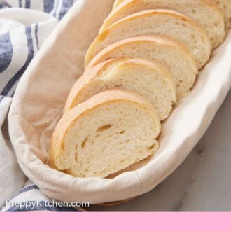 Pinterest graphic of a bread basket with sliced Italian bread.