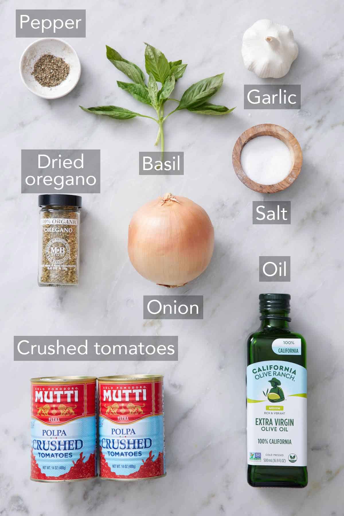 Ingredients needed to make marinara sauce.