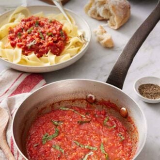 Pinterest graphic of a pot of marinara sauce with torn bread in the back and a bowl of noodles with marinara sauce on top.