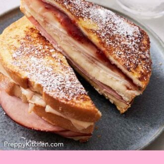 Pinterest graphic of a Monte Cristo sandwich cut in half with one half leaned on top of the other.